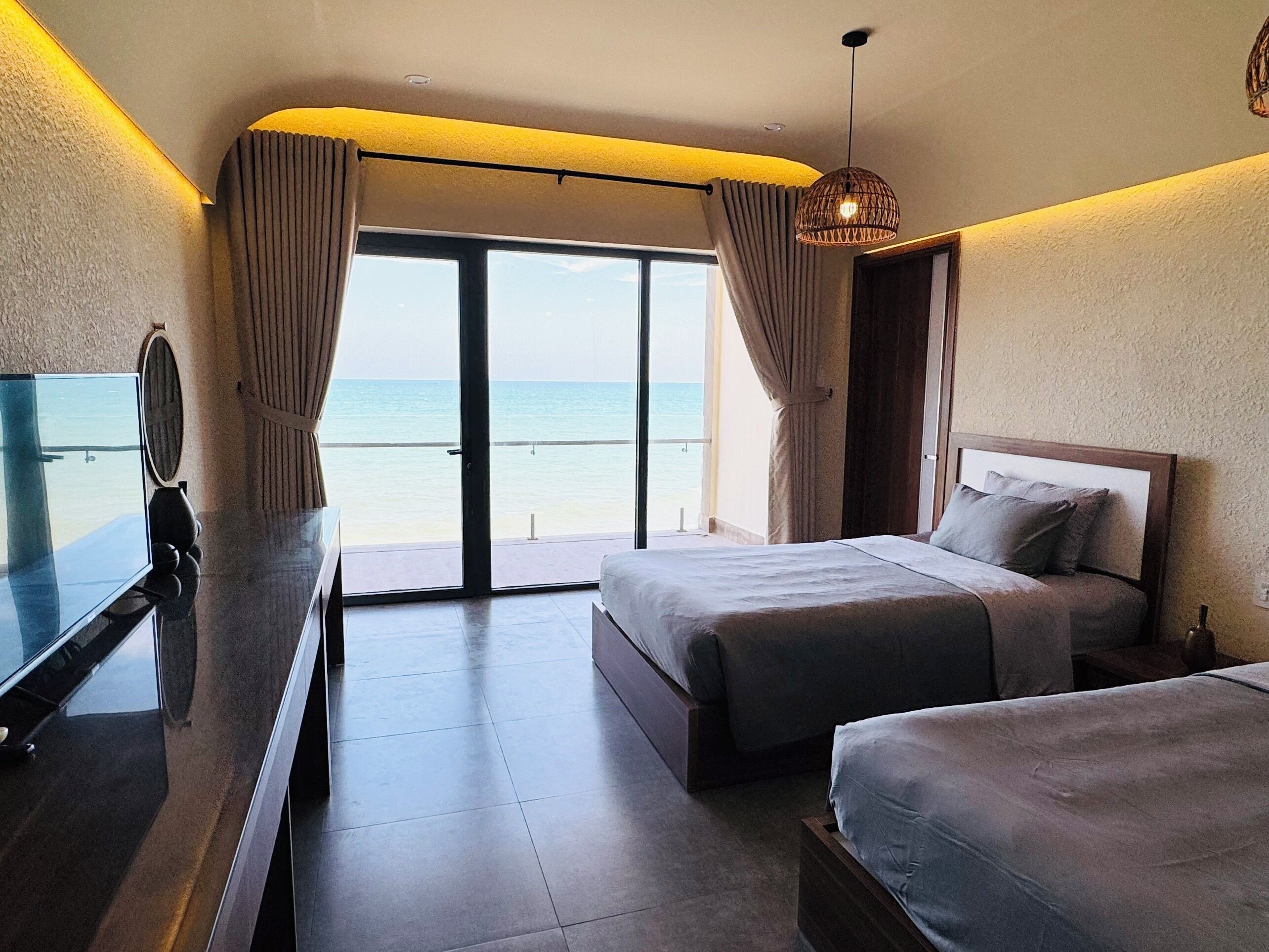 Kamar Double atau Twin Deluks, balkon, pemandangan pantai | Pemandangan pantai/laut