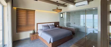 Luxury Suite, Balcony, Beach View | Hypo-allergenic bedding, pillowtop beds, minibar, in-room safe