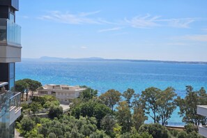 A coastal view with a clear sky, a body of water, and buildings in the foreground. - 307 B, Sea View One Bedroom Apartment, Vlore, Albania (Vlore)
