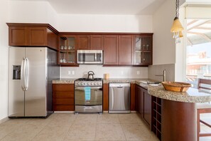 Private kitchen - Beautiful top floor Two Bedroom Oceanview (Bajos de Chila)