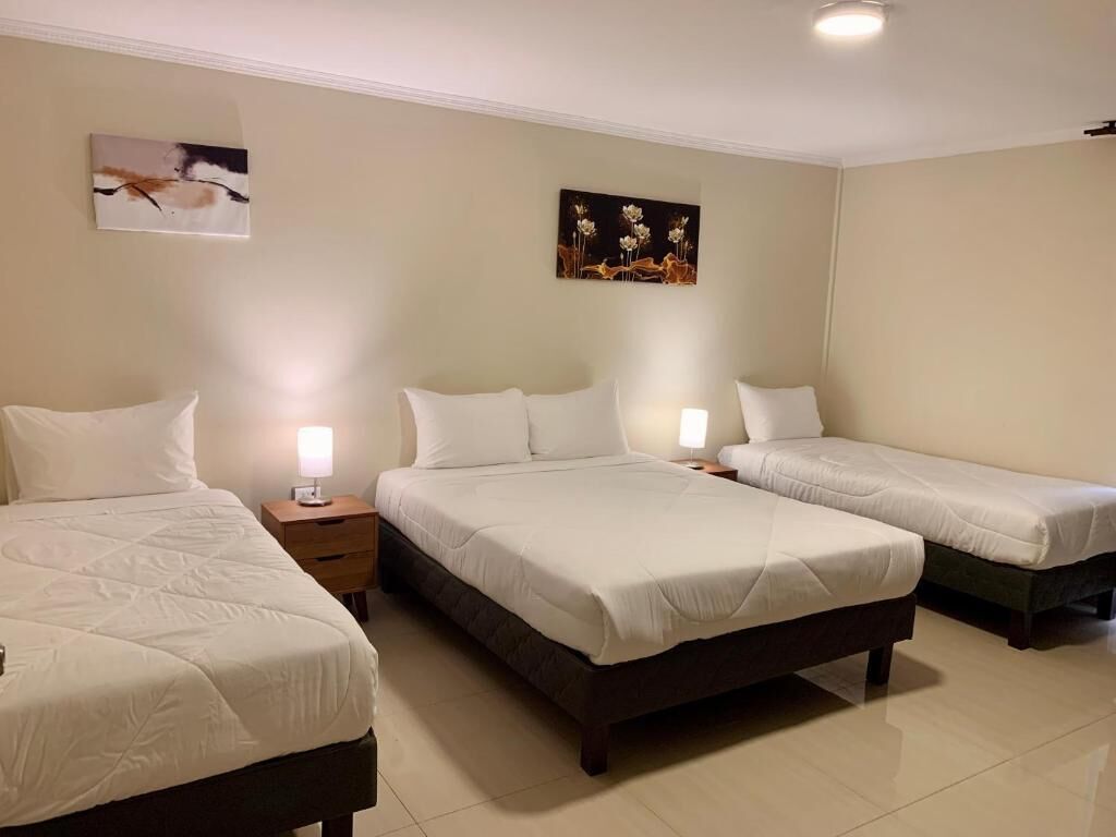 Quarto família, vista para o pátio