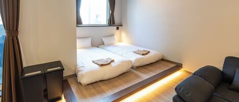 Condo | Desk, laptop workspace, blackout drapes, soundproofing