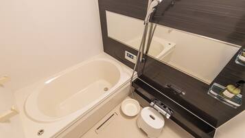 Apartment | Bathroom | Combined shower/tub, hair dryer, slippers, towels