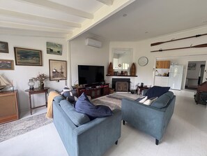 Smart TV, fireplace, books