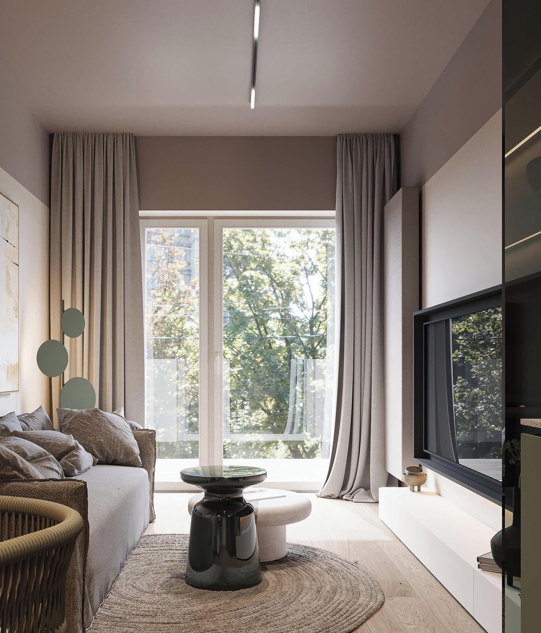 A modern living room with a sofa, a coffee table, a television, and a large window with curtains.