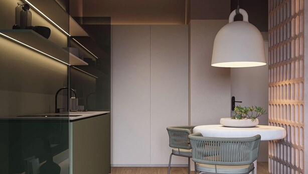 A modern kitchen with built-in appliances, a dining area with wicker chairs, and a pendant light. - Modern Studio in the City Center Gym and Game Room (Katowice)
