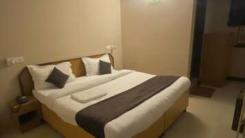 Quarto luxo | Wi-Fi de cortesia, roupa de cama