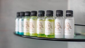 A row of hotel bath products on a shelf. - TTI Hotel (Ulaanbaatar)