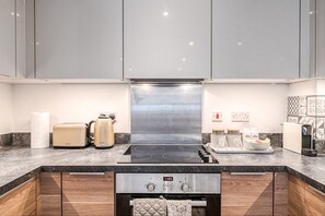 Fridge, microwave, dishwasher, coffee/tea maker