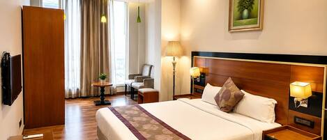 Deluxe Room, City View | Laptop workspace, free WiFi