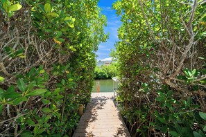 Property grounds - Canal Front, Bay Breeze Bungalow by SeaBreeze Vacation (Anna Maria)