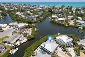 Exterior - Canal Front, Bay Breeze Bungalow by SeaBreeze Vacation (Anna Maria)