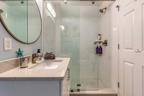 Shower, hair dryer, towels - Canal Front, Bay Breeze Bungalow by SeaBreeze Vacation (Anna Maria)