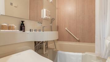 Combined shower/tub, hair dryer, slippers, towels