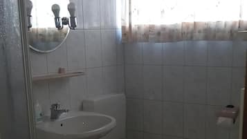 Regadera y secadora de cabello