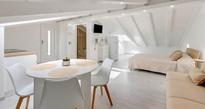 Brand new attic studio apartment, air conditioned