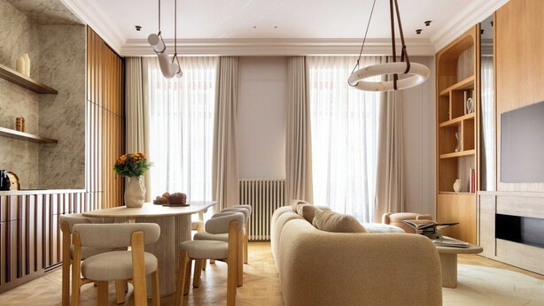 A modern living room with a sofa, chairs, a dining table, and a TV. - Luxury A/C Apt - 10P/4BDR - Arc de Triomphe (Paris)