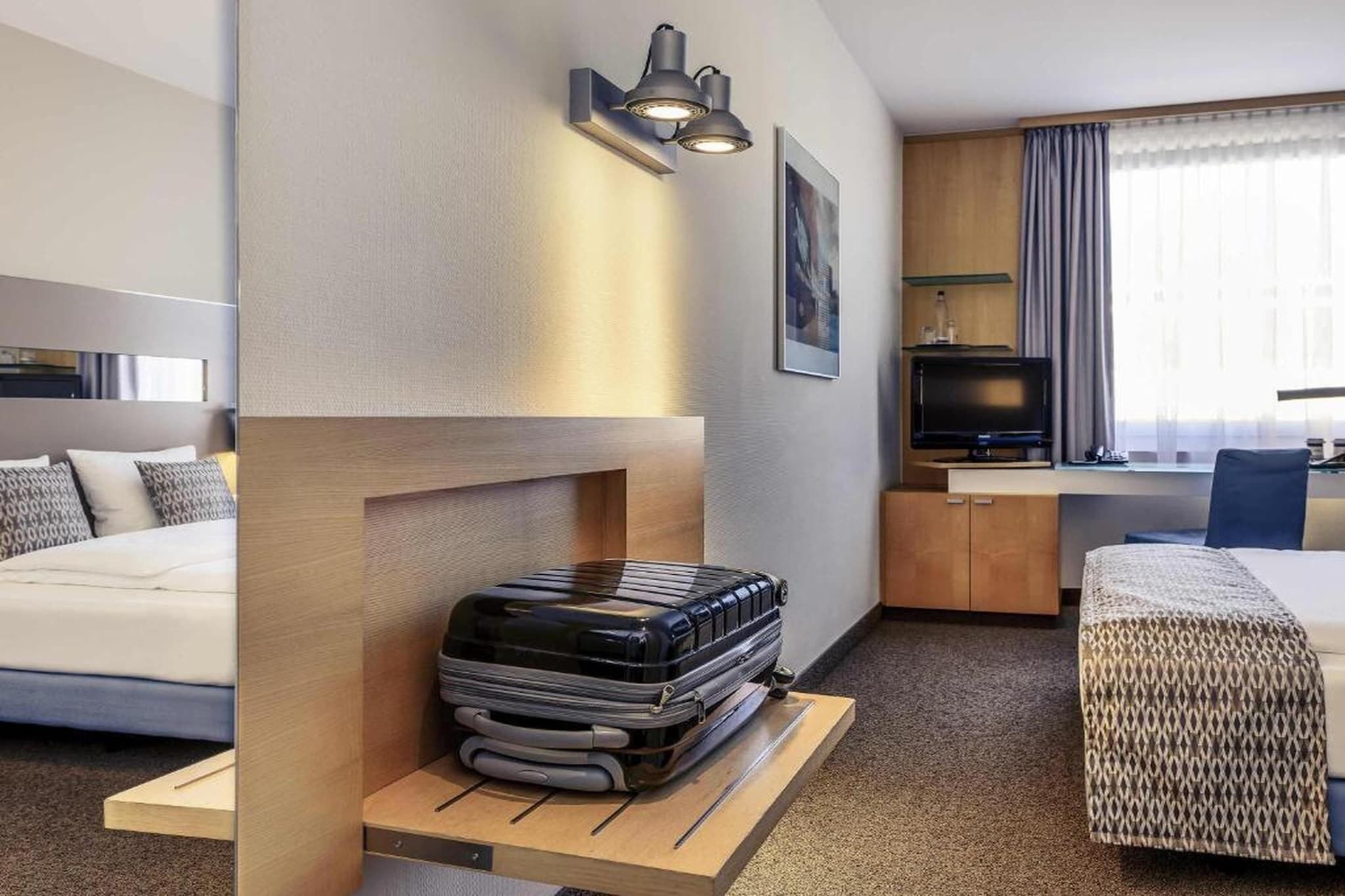 Desk, iron/ironing board, travel crib, WiFi (free)