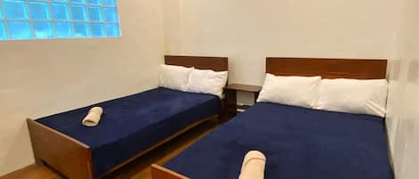 Family Room, Garden View | In-room safe, individually decorated, individually furnished