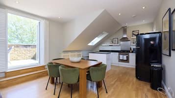 Apartamento, sacada | Cozinha privada
