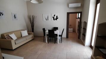 Appart'hÎtel Confort, 1 chambre, patio, vue jardin | Coin séjour