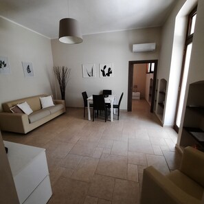 Appartamento Comfort, 1 camera da letto, patio, vista giardino | Area soggiorno