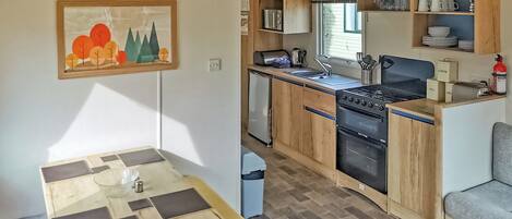 Refrigerador, horno, parrilla de estufa y tostadora