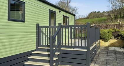 Luxury caravan with one double and one twin room.