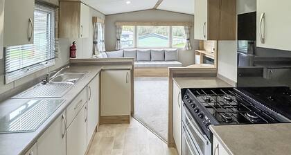 Luxury caravan with one double and one twin room.