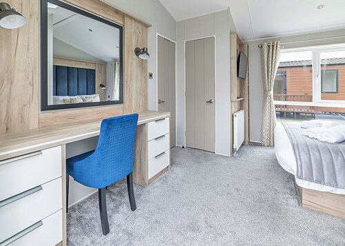 Modern two-bedroom lodge, perfect for couples or families.