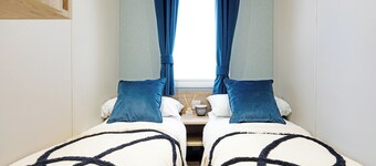 Cosy holiday home with one double and one twin.