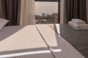 Lit parapluie, Wi-Fi gratuit, draps fournis