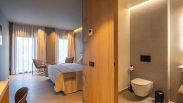 Premium Apartment, Garden View | Desk, laptop workspace, free WiFi