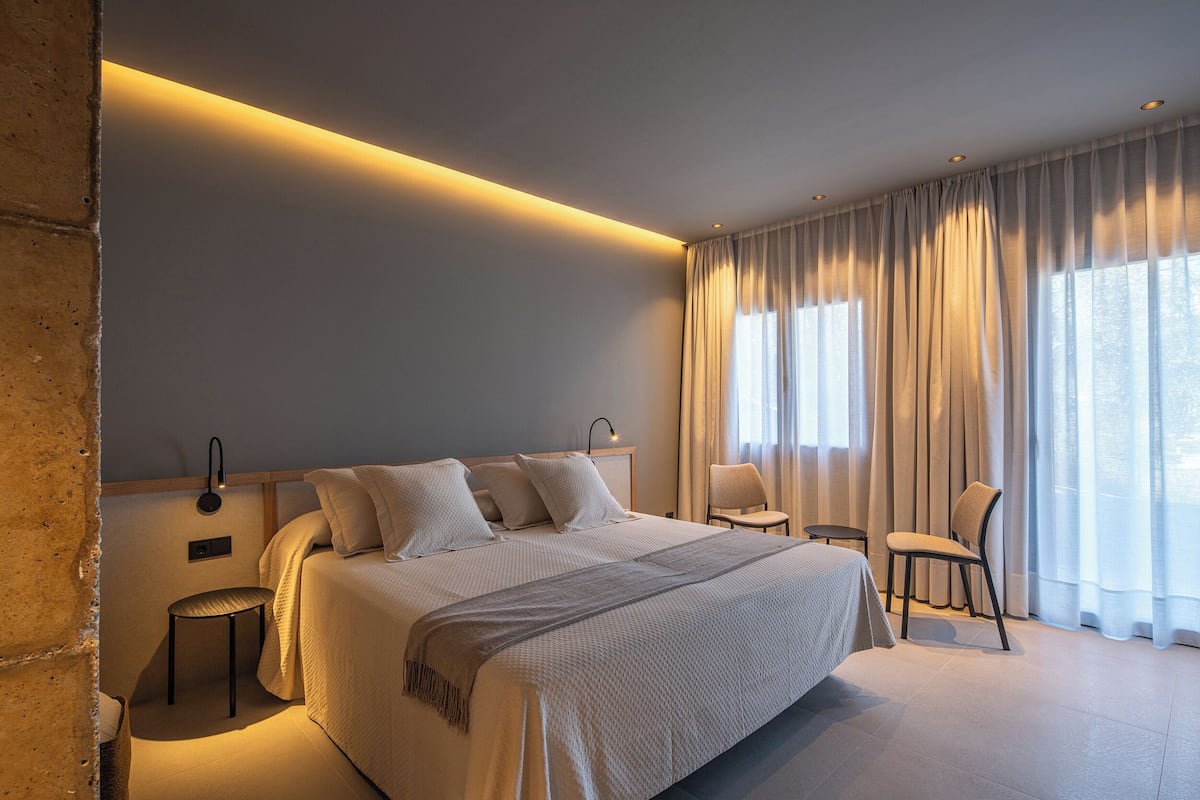 พรีเมียมอพาร์ทเมนท์, วิวสวน | เครื่องนอนระดับพรีเมียม, โต๊ะทำงาน, พื้นที่ทำงานแบบใช้แล็ปท็อป