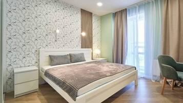 Deluxe Apartment, Balcony, Courtyard View | Blackout drapes, iron/ironing board, free WiFi