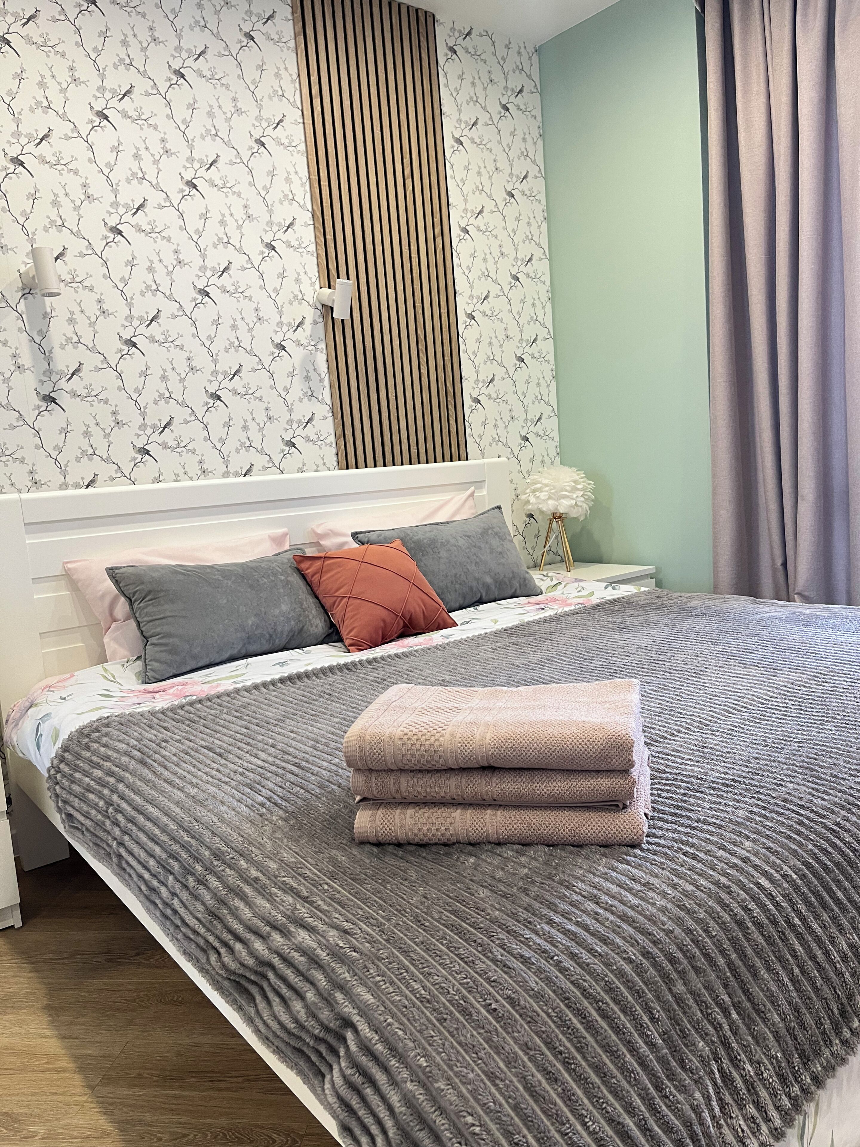 Căn hộ Deluxe, ban công, quang cảnh sân vườn | Màn/rèm cản sáng, bàn ủi/dụng cụ ủi quần áo 
