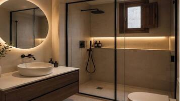 Standaard appartement | Badkamer | Een haardroger, handdoeken, zeep, shampoo