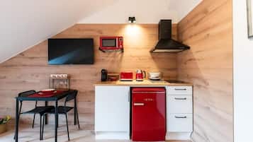Doppia Classic, angolo cottura | Cucina privata | Frigorifero, piano cottura, macchina per caffè espresso