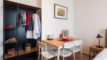 Family Room, City View | Dining