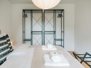 Iron/ironing board, travel crib, free WiFi, bed sheets
