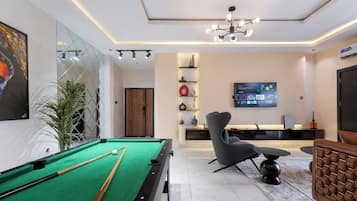 Economy Apartment, Balcony, City View | Games room