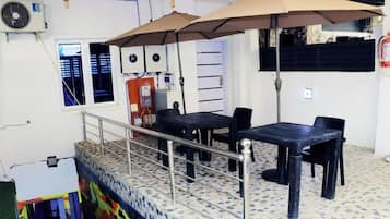 Deluxe Apartment, Balcony, City View | Dining