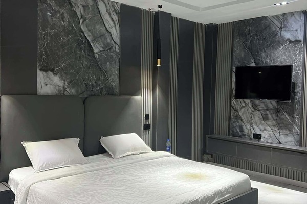 Deluxe Room, Balcony, City View | In-room safe, desk, laptop workspace, blackout drapes