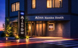 A hotel entrance with signage reading 'Ainn Namba South' and 'Ainn your second home.' - Minn Namba South (Osaka)