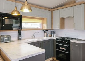 Fridge, oven, stovetop, toaster - 3 bedroom accommodation in Mawgan Porth, Nr Newquay (Mawgan Porth, Nr Newquay)