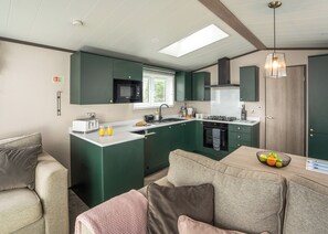 Fridge, oven, stovetop, toaster - 3 bedroom accommodation in Mawgan Porth, Nr Newquay (Mawgan Porth, Nr Newquay)