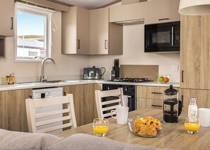 Fridge, oven, stovetop, toaster - The Luxury 2 Bed is a quality sleeps 6 holiday Home with contemporary features. (Landford, Nr Salisbury)