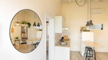 Fridge, microwave, stovetop, coffee/tea maker