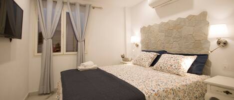 2 habitaciones, tabla de planchar con plancha, wifi y ropa de cama