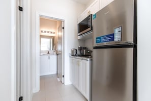 Fridge, microwave, coffee/tea maker, electric kettle